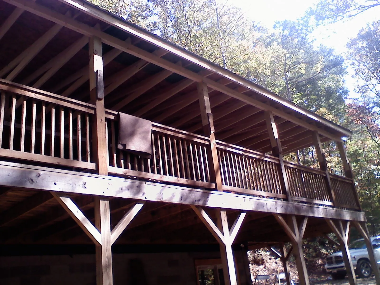 Timber framing under a new elevated porch and deck — Roof Leak Repair in Kansasville by Roofing Brothers